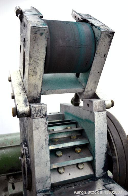 Used Cumberland Size 4 Pelletizer.  4” Wide x 8” diameter 16 bolt-on blade rotor, (1) rubber, (1) metal pull roll.  Driven by a 2 hp, 180 volt, 1750 rpm DC motor.  Unit mounted on a frame with caster...