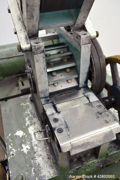 Used Cumberland Size 4 Pelletizer.  4” Wide x 8” diameter 16 bolt-on blade rotor, (1) rubber, (1) metal pull roll.  Driven by a 2 hp, 180 volt, 1750 rpm DC motor.  Unit mounted on a frame with caster...