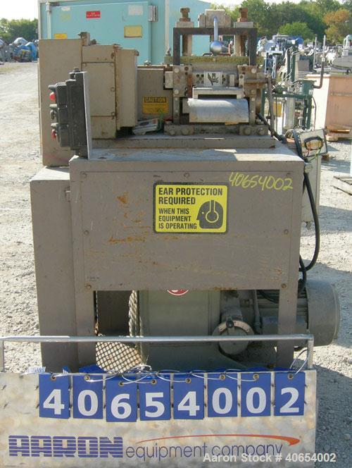 Used Cumberland 6 Pelletizer. 6 5/8" wide 16 bolt on blade rotor, (1) rubber, (1) metal manually adjustable pull roll.  Driven by a 5 hp, 3/60/230/460 volt, 1750 rpm varispeed motor, ratio 1.82 to 1,...
