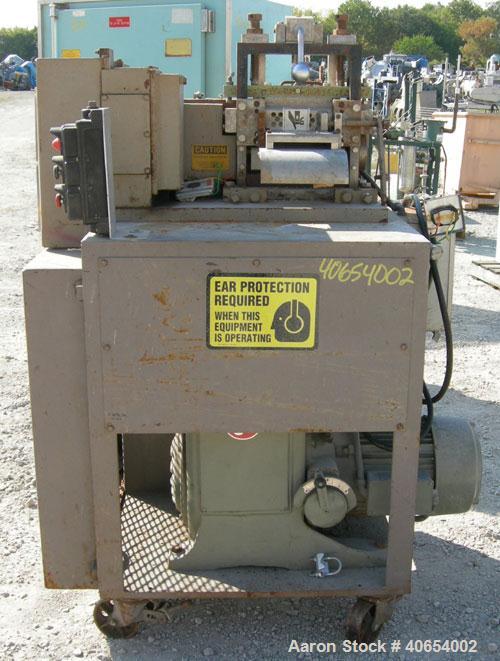 Used Cumberland 6 Pelletizer. 6 5/8" wide 16 bolt on blade rotor, (1) rubber, (1) metal manually adjustable pull roll.  Driven by a 5 hp, 3/60/230/460 volt, 1750 rpm varispeed motor, ratio 1.82 to 1,...