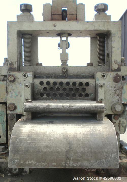 Used Cumberland Pelletizer, Size 6. Approximate 6" diameter x 6-1/2" wide 8 bolt- on blade rotor. Approximate 4" diameter pull roll. Driven by an approximate 5 hp varispeed motor. Mounted on casters.