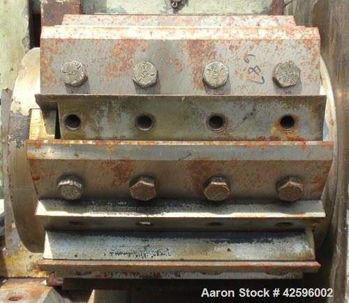 Used Cumberland Pelletizer, Size 6. Approximate 6" diameter x 6-1/2" wide 8 bolt- on blade rotor. Approximate 4" diameter pull roll. Driven by an approximate 5 hp varispeed motor. Mounted on casters.