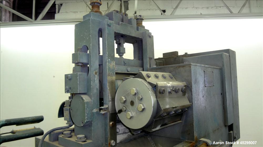 Used Cumberland Size 6 Pelletizer. Approximately 6-3/4" wide x 12" diameter (8) bolt on blade rotor; (1) rubber, (1) metal manually adjustable pull roll. Driven by a 5 hp, 3/60/208-230/460 volt, 1740...