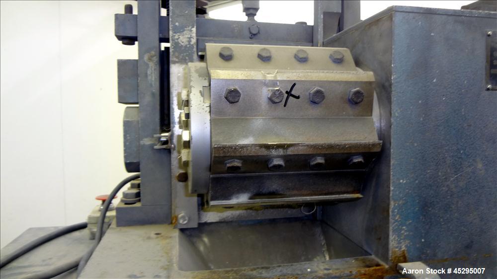 Used Cumberland Size 6 Pelletizer. Approximately 6-3/4" wide x 12" diameter (8) bolt on blade rotor; (1) rubber, (1) metal manually adjustable pull roll. Driven by a 5 hp, 3/60/208-230/460 volt, 1740...