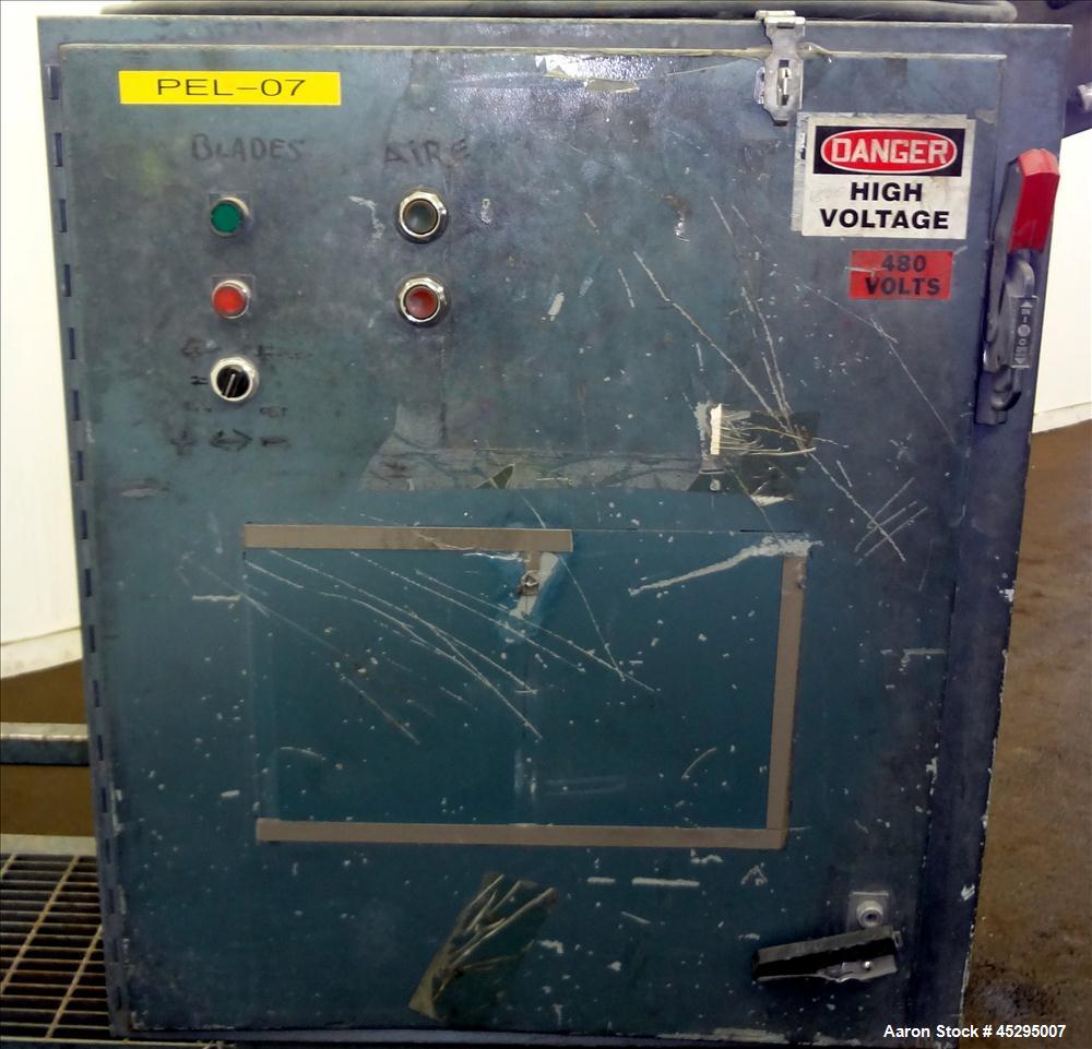 Used Cumberland Size 6 Pelletizer. Approximately 6-3/4" wide x 12" diameter (8) bolt on blade rotor; (1) rubber, (1) metal manually adjustable pull roll. Driven by a 5 hp, 3/60/208-230/460 volt, 1740...