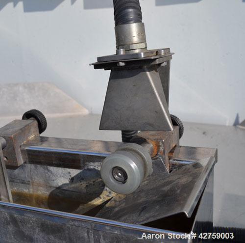 Used Prism Pelletizer. Approximately 3/4’’ wide x 2’’ diameter rotor. Includes a Prism stainless steel water bath, 4-3/4’’ wide x 39-1/2’’ long x 5-7/8’’ deep, and a Prism 3’’ wide air knife, driven ...