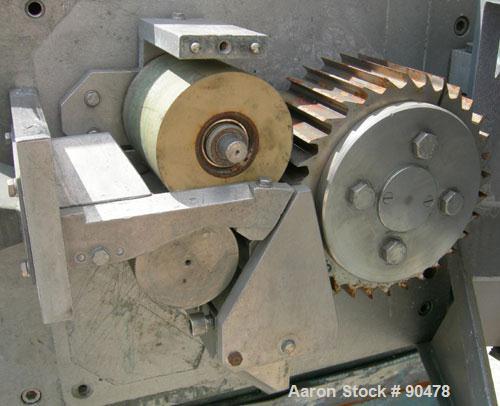 Used C.F. Scheer Strand Pelletizer, Model SGS 100-EL. Approximately 8" diameter x 4" wide 32 blade helical rotor. (1) Rubber, (1) metal pull roll. Driven by a 4 KW (5.3 HP) 3/50/230/400 Volt, 1440 RP...