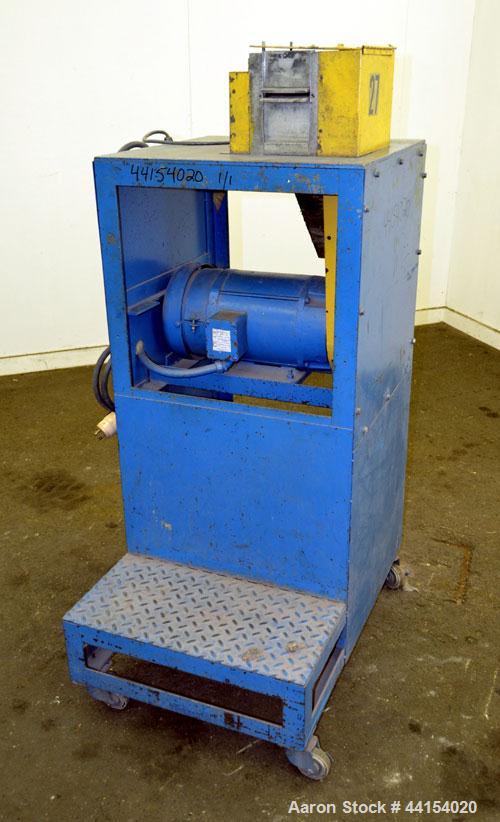 Used Wayne Pelletizer. Approximate 4" wide x 6" diameter (12) bolt on blade rotor. (1) Rubber, (1) metal pull rolls. Driven by an approximate 5hp motor. Includes a Focus 2 DC drive. Mounted on a fram...