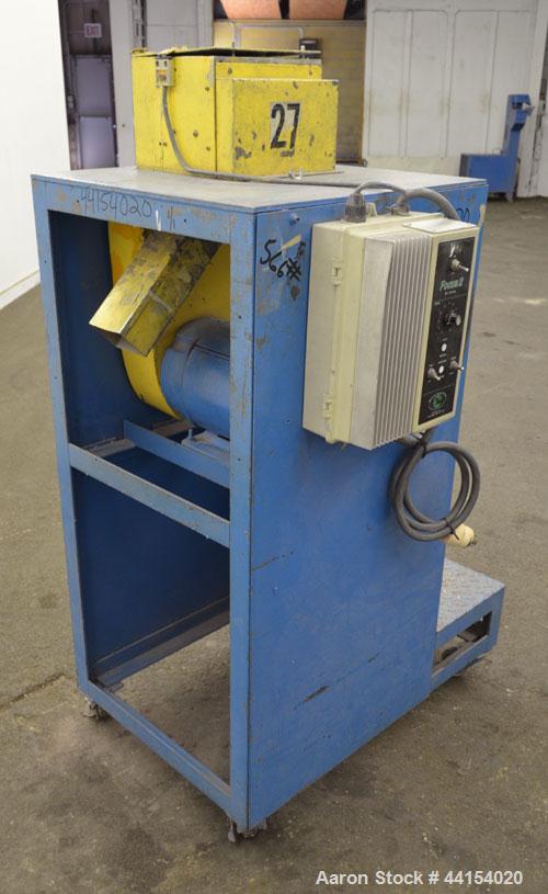 Used Wayne Pelletizer. Approximate 4" wide x 6" diameter (12) bolt on blade rotor. (1) Rubber, (1) metal pull rolls. Driven by an approximate 5hp motor. Includes a Focus 2 DC drive. Mounted on a fram...
