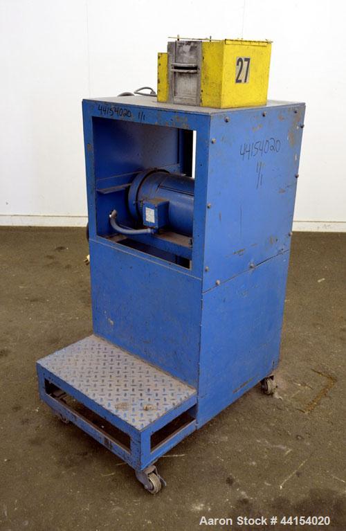 Used Wayne Pelletizer. Approximate 4" wide x 6" diameter (12) bolt on blade rotor. (1) Rubber, (1) metal pull rolls. Driven by an approximate 5hp motor. Includes a Focus 2 DC drive. Mounted on a fram...