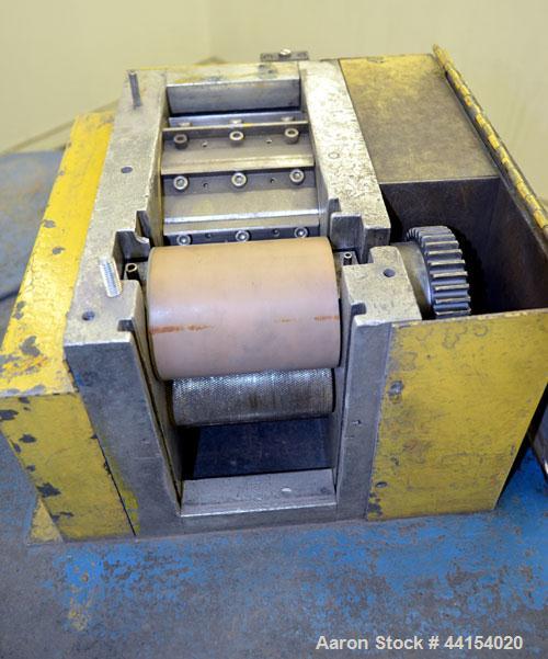 Used Wayne Pelletizer. Approximate 4" wide x 6" diameter (12) bolt on blade rotor. (1) Rubber, (1) metal pull rolls. Driven by an approximate 5hp motor. Includes a Focus 2 DC drive. Mounted on a fram...