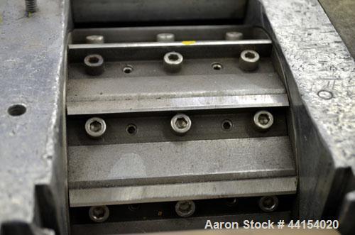 Used Wayne Pelletizer. Approximate 4" wide x 6" diameter (12) bolt on blade rotor. (1) Rubber, (1) metal pull rolls. Driven by an approximate 5hp motor. Includes a Focus 2 DC drive. Mounted on a fram...