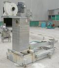 Used Beringer water ring pelletizer, model WRP12V. (1) cutting head driven by a 2 hp motor, no blade; (1) 3 hp spin dryer; (1) blower; (1) water slide with holding tank and pump, and (1) control pane...
