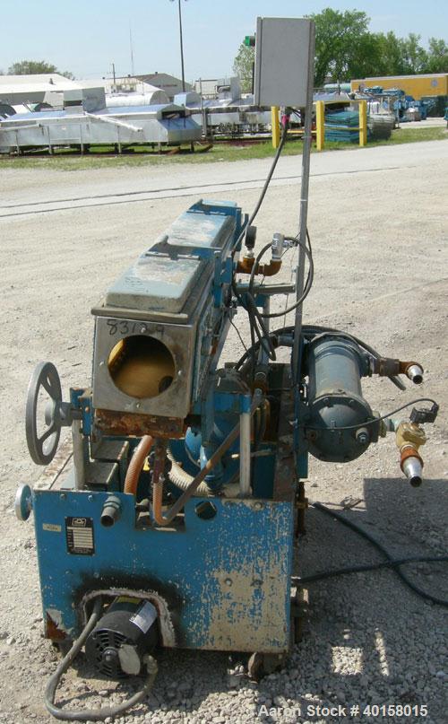 Used RDN vacuum sizing tank, model 2D-1V-1T-6, 304 stainless steel. 8" wide x 7.5" deep x 72" long. (1) section with a cover. 4" diameter end openings. Includes holding tank, heat exchanger, 1-1/2 hp...