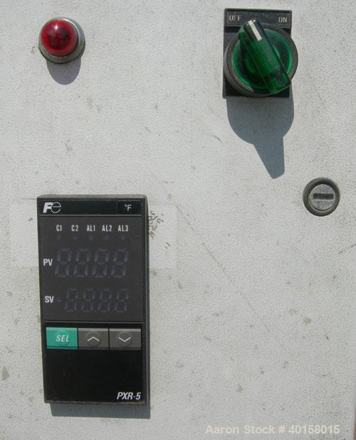 Used RDN vacuum sizing tank, model 2D-1V-1T-6, 304 stainless steel. 8" wide x 7.5" deep x 72" long. (1) section with a cover. 4" diameter end openings. Includes holding tank, heat exchanger, 1-1/2 hp...