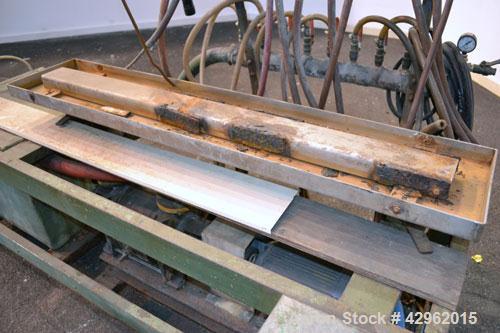 Used Vacuum Calibration Table Consisting Of: (1) 11-1/2" Wide x 59-5/8" long  x 1-3/4" deep vacuum table section; (1) stainless steel pan; (1) Vacuum pump, driven by a 5hp, 3/60/208-230/460 volt, 175...