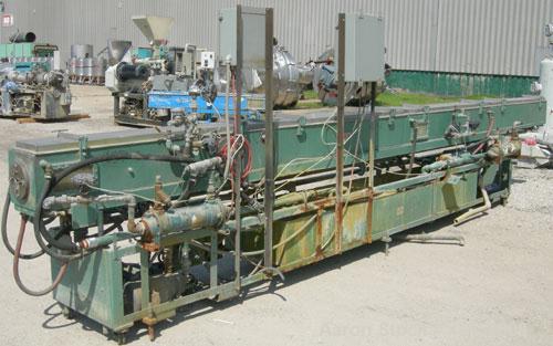 Used- RDN Vacuum Sizing Tank, model 4D2V2T24, 304 stainless steel. 12" wide x 12" deep x 24' long. (4) sections with covers....