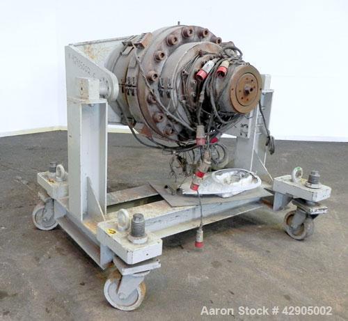 Used Battenfeld 24’’ Maximum Diameter PVC Pipe Extrusion Line. Consisting of: (1) Battenfeld 168 mm counter-rotating twin screw extruder, model BEX-2-168/28, serial# 9621-61, built 2000. Electrically...