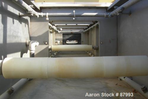 Used Custom Downstream Systems Vacuum Sizing Tank, Model CVS-20-16-20, 304 stainless steel. (4) Sections, 16" wide x 20" deep x 240" long. Plexiglass top covers. Includes holding tank, heat exchanger...