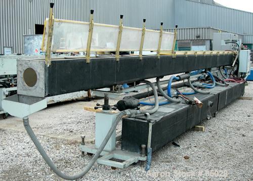 USED: Custom Downstream System vacuum sizing tank, model CVS12-30-LEFT, 304 stainless steel. 12" wide x 12" deep x 30' long. Includes holding tank, heat exchanger, pumps, panel and covers. Mounted on...