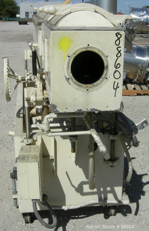 USED: Conair/Gatto vacuum sizing tank, model DPC-105C-8-2, 304 stainless steel, 12" wide x 12" deep x 8' long. (2) Section with plastic covers. Includes holding tank and centrifugal pump. Mounted on ...