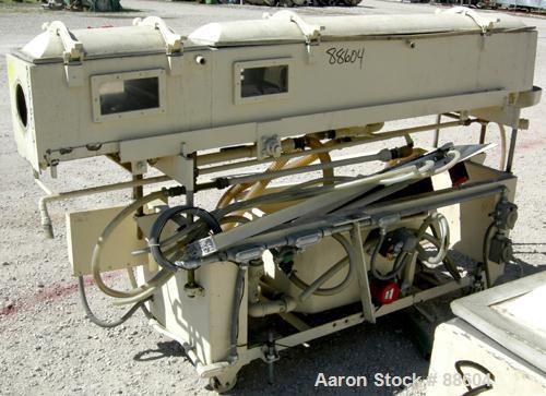 USED: Conair/Gatto vacuum sizing tank, model DPC-105C-8-2, 304 stainless steel, 12" wide x 12" deep x 8' long. (2) Section with plastic covers. Includes holding tank and centrifugal pump. Mounted on ...