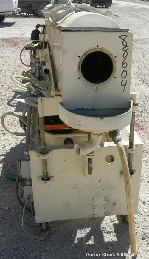 USED: Conair/Gatto vacuum sizing tank, model DPC-105C-8-2, 304 stainless steel, 12" wide x 12" deep x 8' long. (2) Section with plastic covers. Includes holding tank and centrifugal pump. Mounted on ...