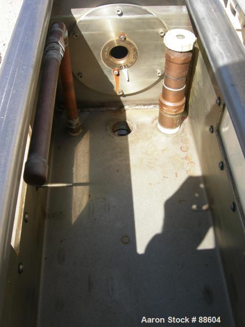 USED: Conair/Gatto vacuum sizing tank, model DPC-105C-8-2, 304 stainless steel, 12" wide x 12" deep x 8' long. (2) Section with plastic covers. Includes holding tank and centrifugal pump. Mounted on ...