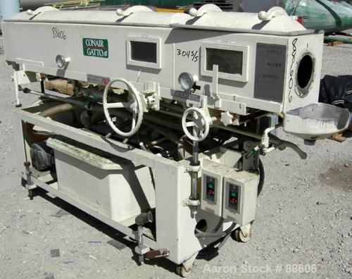 USED: Conair/Gatto vacuum sizing tank, model DPC-105C-8-2, 304 stainless steel, 12" wide x 12" deep x 8' long. (2) Section with plastic covers. Includes holding tank and centrifugal pump. Mounted on ...