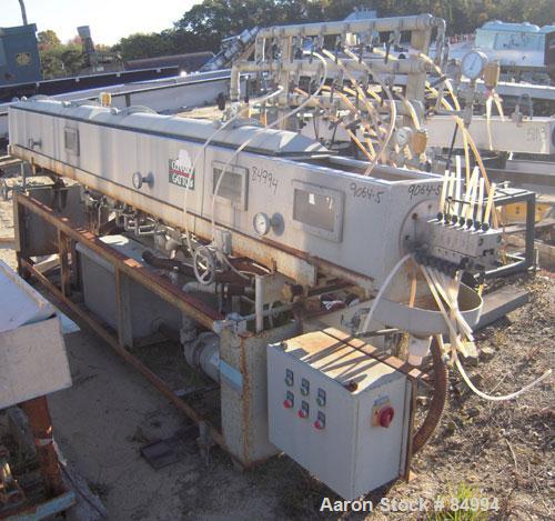 Used Conair Gatto Vacuum Tank, Model DPC0105C-14-3, stainless steel. Approximately 12" wide x 12" deep x 168" long. Unit consists of (1) 2 foot start-up section and (2) 6 foot compartments. Set up fo...