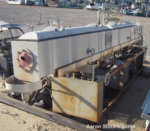 Used Conair Gatto Vacuum Tank, Model DPC0105C-14-3, stainless steel. Approximately 12" wide x 12" deep x 168" long. Unit consists of (1) 2 foot start-up section and (2) 6 foot compartments. Set up fo...