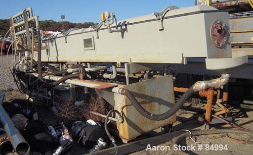 Used Conair Gatto Vacuum Tank, Model DPC0105C-14-3, stainless steel. Approximately 12" wide x 12" deep x 168" long. Unit consists of (1) 2 foot start-up section and (2) 6 foot compartments. Set up fo...