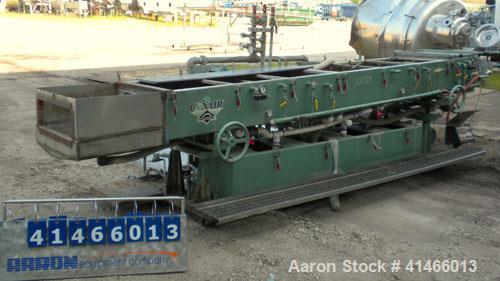 Used Conair Metaplast Vacuum Sizing Tank, Model MVS3-14-SP L-R, 304 stainless steel. 28" wide x 12" deep x 164" long. No top covers. Includes holding tank, heat exchanger, centrifugal pumps, vacuum p...