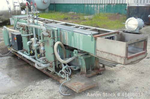 Used Conair Metaplast Vacuum Sizing Tank, Model MVS3-14-SP L-R, 304 stainless steel. 28" wide x 12" deep x 164" long. No top covers. Includes holding tank, heat exchanger, centrifugal pumps, vacuum p...