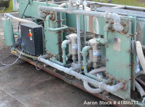 Used Conair Metaplast Vacuum Sizing Tank, Model MVS3-14-SP L-R, 304 stainless steel. 28" wide x 12" deep x 164" long. No top covers. Includes holding tank, heat exchanger, centrifugal pumps, vacuum p...