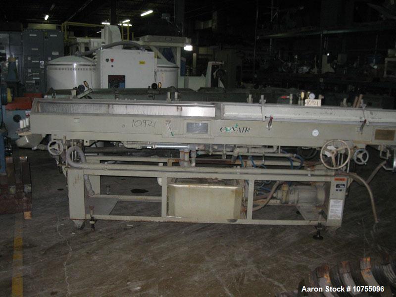 Used Conair Stainless Steel Vacuum Tank 12' long x 8" wide x 8" tall.  Fiberglass lids, sightglasses, manual independent height and side to side adjustable, mounted on carbon steel frame with casters...