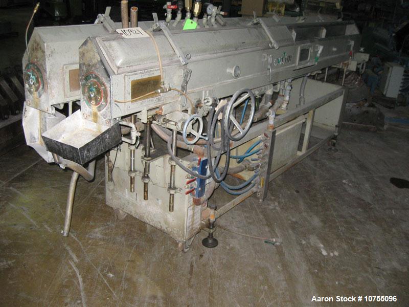 Used Conair Stainless Steel Vacuum Tank 12' long x 8" wide x 8" tall.  Fiberglass lids, sightglasses, manual independent height and side to side adjustable, mounted on carbon steel frame with casters...