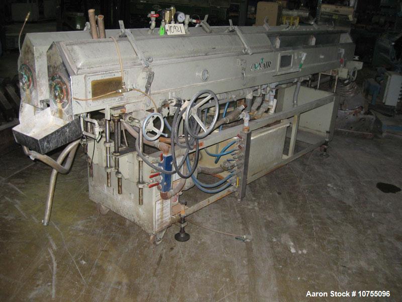 Used Conair Stainless Steel Vacuum Tank 12' long x 8" wide x 8" tall.  Fiberglass lids, sightglasses, manual independent height and side to side adjustable, mounted on carbon steel frame with casters...