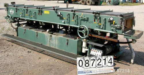USED: Conair Metaplast vacuum sizing tank, stainless steel. 28" wide x 14' long x 13" deep. Includes (2) 5 hp pumps, (2) 2 hp centrifugal pumps, (3) piece top cover, (2) APV plate heat exchangers, ho...