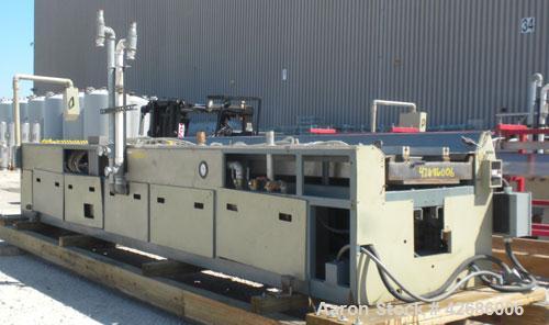 Used Crown Vacuum Calibrating Table, Model CMZDY. Stainless steel pan 24" wide x 231" long x approximately 3-3/4" deep. 2. The dies are connected with aluminum alloy “T” guiding rails and bolts. Incl...