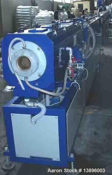 Used Pipe Extrusion Line, capacity 220 lbs/hour (100 kg/h), 106.7 hp/80 kW drive, water cooling, pipe diameters 0.79", 0.99", 1.26", 1.58", 1.97", 2.45", 2.95" and 3.54" (20, 25, 32, 40, 50, 63, 75, ...