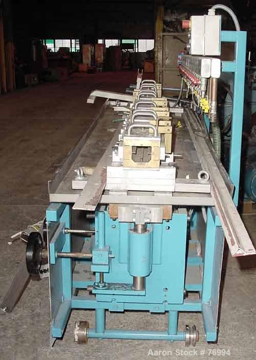 Used Extruplast Vacuum Calibration Table, Model KT2/2-3. Consisting of: (4) 15-3/4" long sections, approximately 2" wide x 2" high. Stainless steel bottom pan with top spray system, approximately (2)...