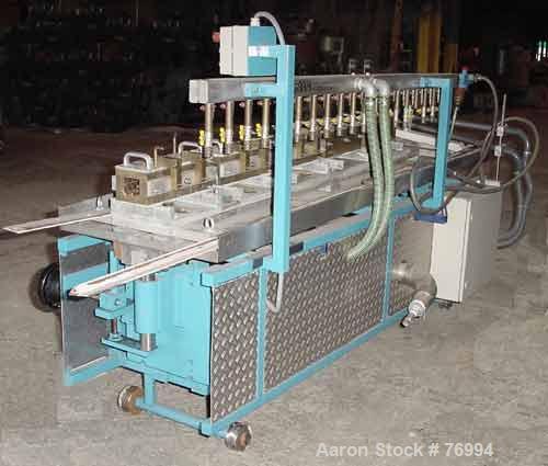Used Extruplast Vacuum Calibration Table, Model KT2/2-3. Consisting of: (4) 15-3/4" long sections, approximately 2" wide x 2" high. Stainless steel bottom pan with top spray system, approximately (2)...