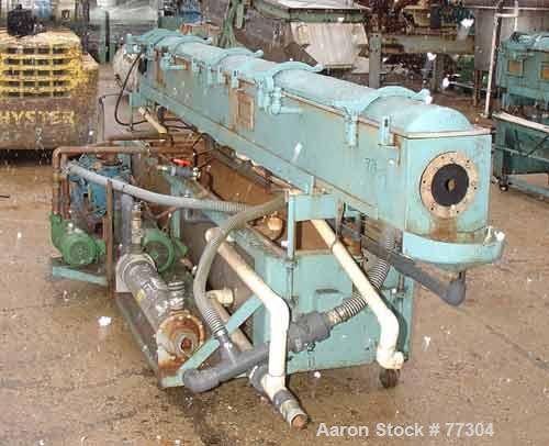 USED: Gatto vacuum sizing tank, model DPC-105B-14-3, stainless steel,12" wide x 12" deep x 14' long. 3 section with covers. 5-1/2" diameterend openings. Includes holding tank, heat exchanger, 5 hp va...