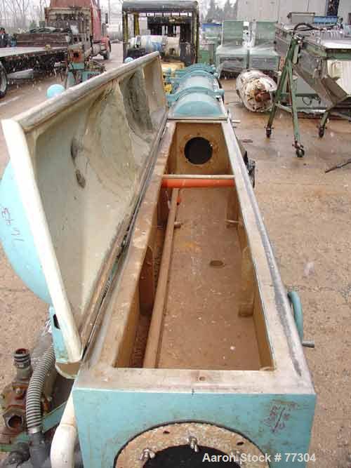 USED: Gatto vacuum sizing tank, model DPC-105B-14-3, stainless steel,12" wide x 12" deep x 14' long. 3 section with covers. 5-1/2" diameterend openings. Includes holding tank, heat exchanger, 5 hp va...