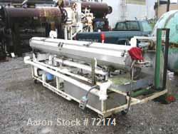 USED: Johnson vacuum sizer, stainless steel. 12" wide x 12" deep x 12' long tank. 3" diameter opening. Hinged cover, mounted on an adjustable portable base. Includes a 5 hp circulating system.