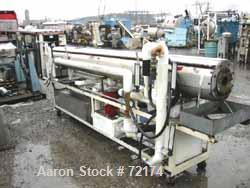 USED: Johnson vacuum sizer, stainless steel. 12" wide x 12" deep x 12' long tank. 3" diameter opening. Hinged cover, mounted on an adjustable portable base. Includes a 5 hp circulating system.