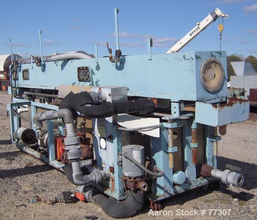 Used OEM Vacuum Sizing Tank, Model OEM VTF, Stainless Steel. 14" wide x 14" deep x 168" long. 3 section with 2 covers. 7-1/2" diameter end openings. Includes holding tank, heat exchanger, 5 hp vacuum...