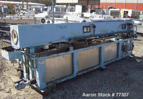 Used OEM Vacuum Sizing Tank, Model OEM VTF, Stainless Steel. 14" wide x 14" deep x 168" long. 3 section with 2 covers. 7-1/2" diameter end openings. Includes holding tank, heat exchanger, 5 hp vacuum...
