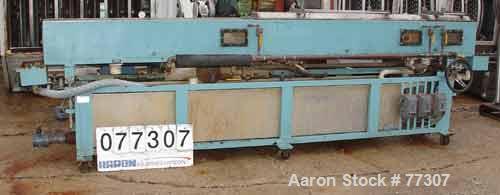 Used OEM Vacuum Sizing Tank, Model OEM VTF, Stainless Steel. 14" wide x 14" deep x 168" long. 3 section with 2 covers. 7-1/2" diameter end openings. Includes holding tank, heat exchanger, 5 hp vacuum...